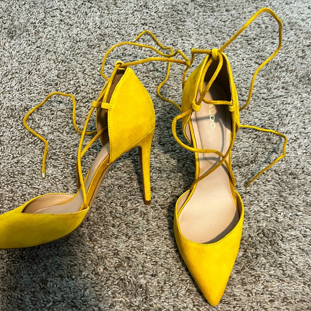 Yellow suede heels. Statement heels to make an outfit more bold.